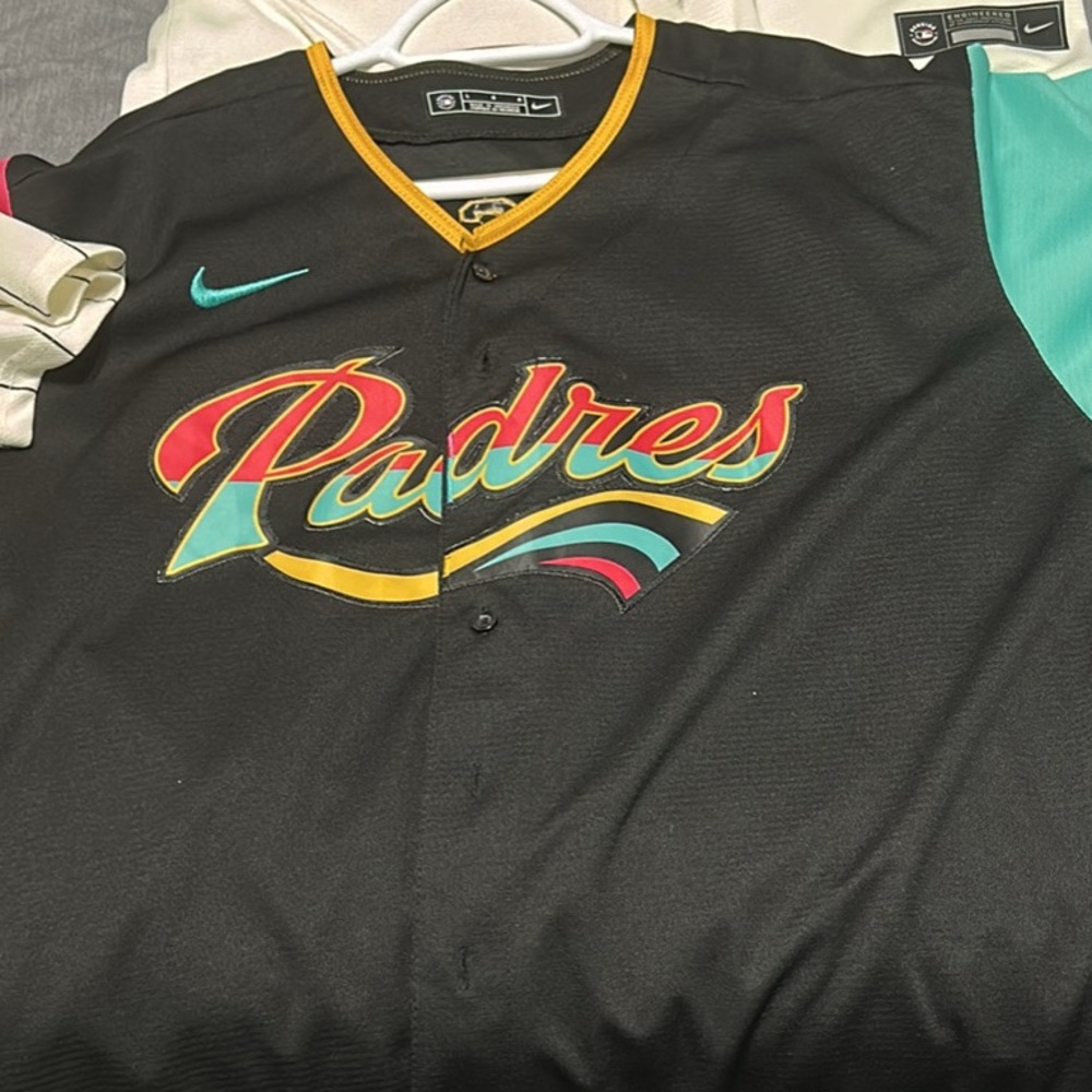 Genuine Merchandise Black and Gold Jersey